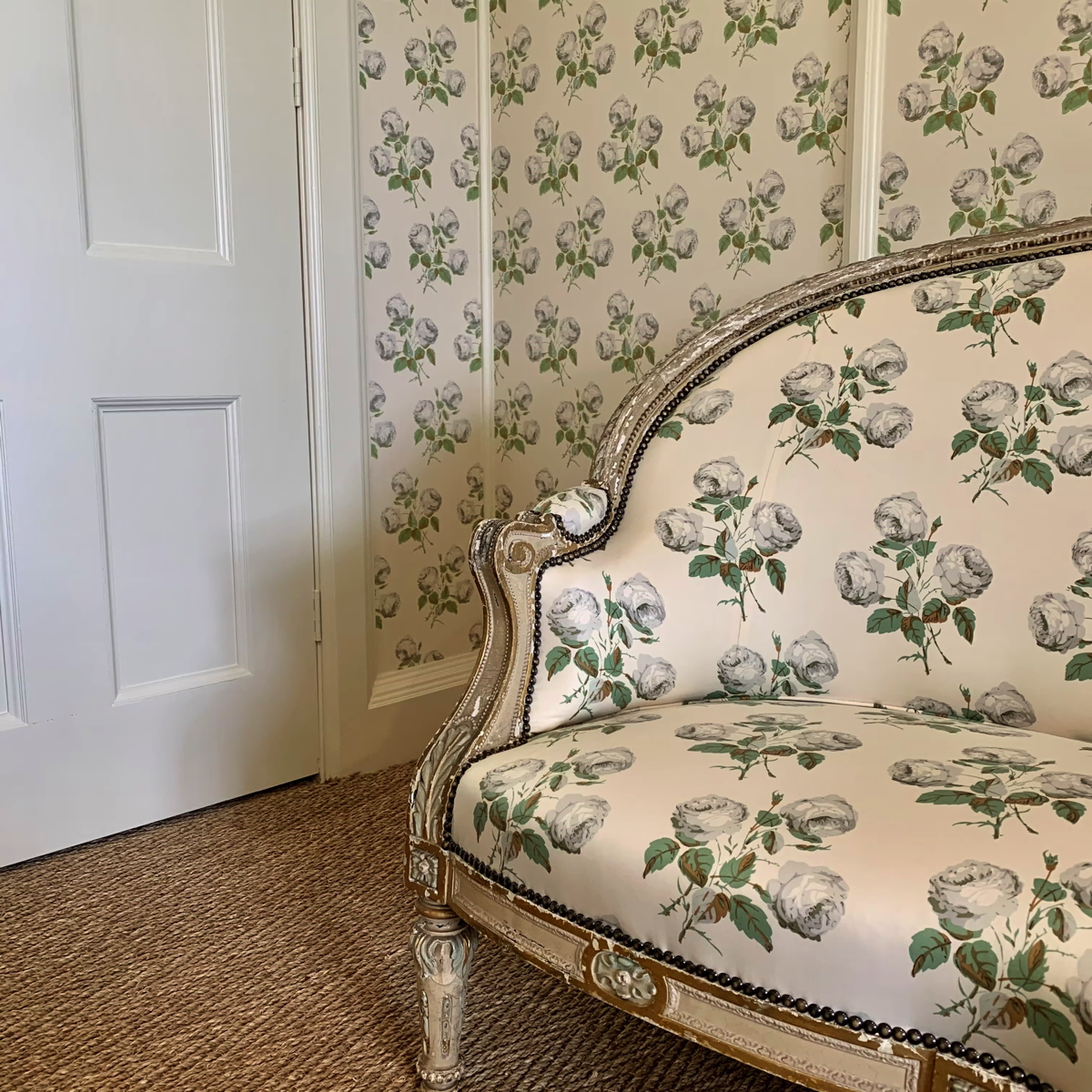 matching rose wallpaper and upholstery